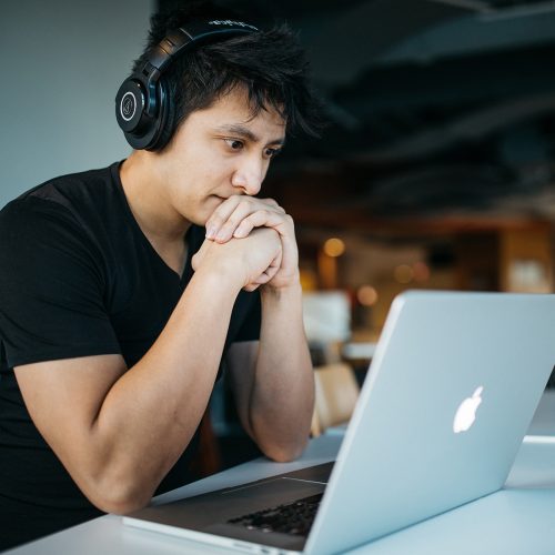 Man looking at a laptop