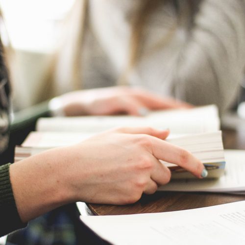 Hands holding a book